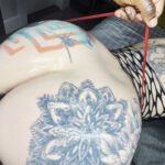 Tattooed Beauty Takes on a Giant Challenge