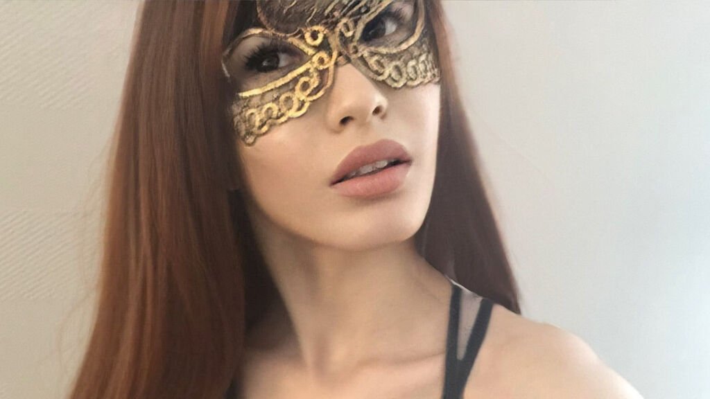 Amateur Webcam Model Unveils GingerMask Secrets