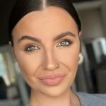 the amateur webcam model with a moon toned glow